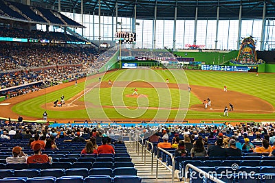 Fans watching a baseball game at the Miami Marlins Stadium