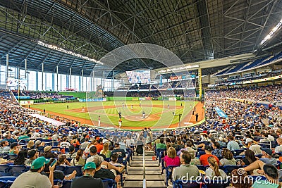 Fans watching a baseball game at the Miami Marlins Stadium