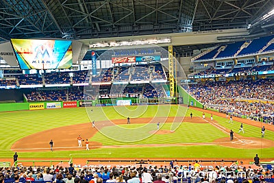 Fans watching a baseball game at the Miami Marlins Stadium