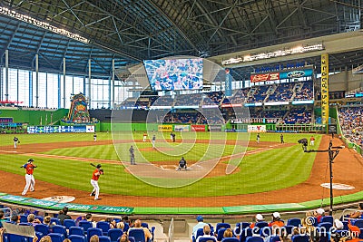 Fans watching a baseball game at the Miami Marlins Stadium