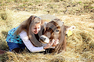 Farm girl and pet cow