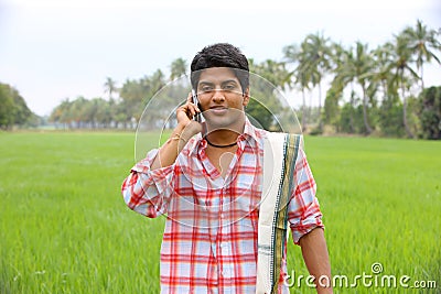 Farmer talking in his cell phone