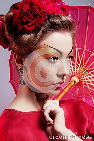 Fashion asian woman wearing traditional japanese red kimono