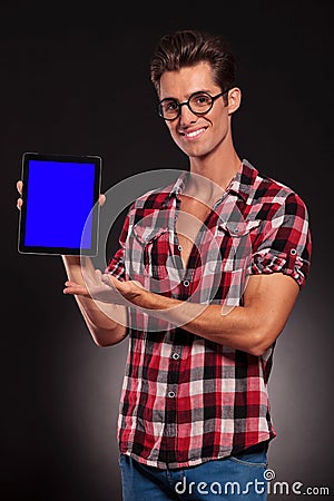 Fashion man presenting a new tablet pad