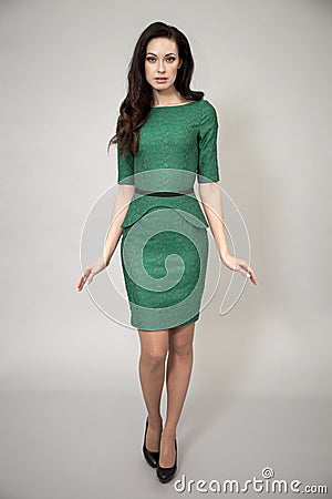 Fashion model in green dress