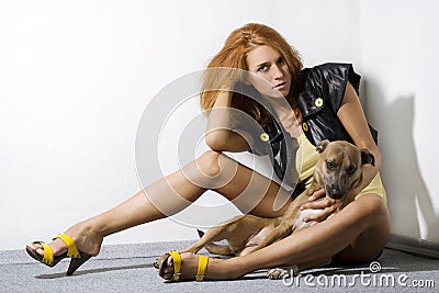 Fashion model posing with dog