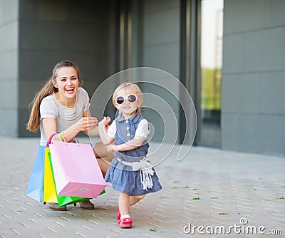 Fashion-monger baby on shopping with mom