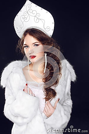 Fashion Russian girl model in Slavic exclusive design clothes on