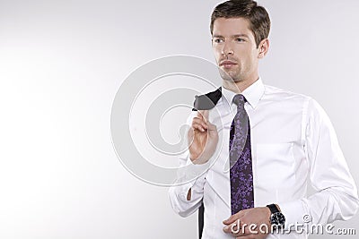 Fashion shot of an elegant young man wearing shirt