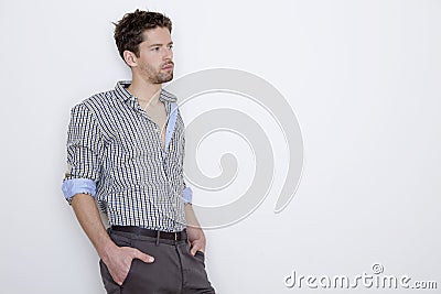 Fashion shot of an elegant young man wearing shirt