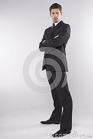 Fashion shot of an elegant young man wearing suit