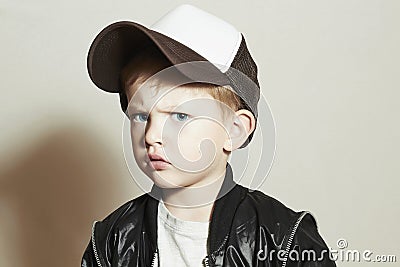 Fashionable little boy.fashion children.Boy in Tracker Hat.Sad Child in Cap