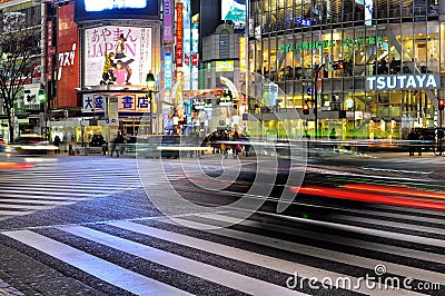 Fast car in the street of shibuya , tokyo , japan