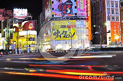 Fast car in the street of shinjuku , tokyo , japan