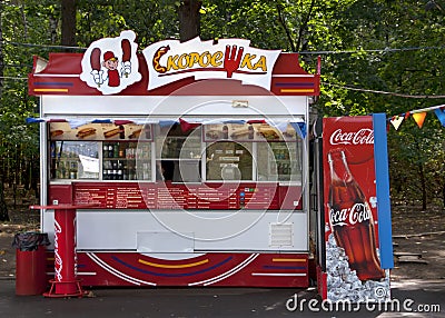 Fast food booth with Coca Cola advertisements in Moscow, Russia.