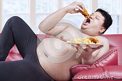 Fat man eats junk food 1