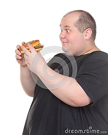 http://thumbs.dreamstime.com/x/fat-man-looks-lustfully-burger-29129962.jpg