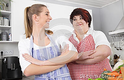 Fat and overweight woman posing in the kitchen