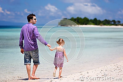 Father and daughter at beach