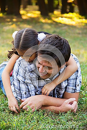 Father and daughter in park