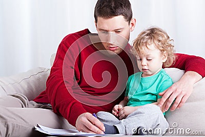 Father painting with his son