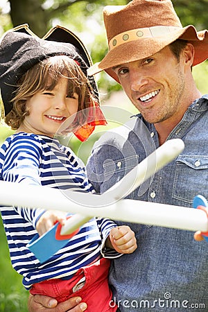 Father Playing Exciting Adventure Game With Son