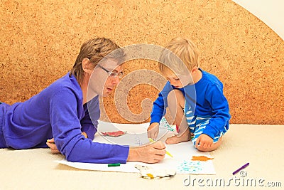 Father and son drawing together