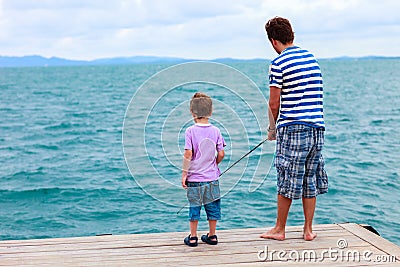 Father and son fishing together