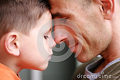 Father and son portrait smiling