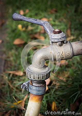Faucet in a grass