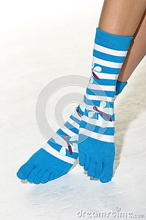 Feet with striped toe socks