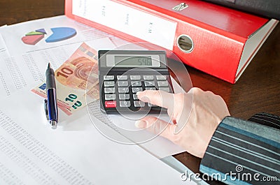Female accountant checking financial documents