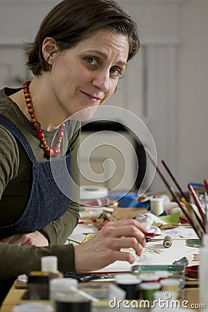 Female artist in her studio