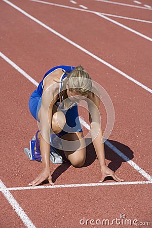 Female Athlete Ready To Race On Track