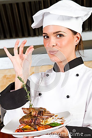 Female chef presenting food