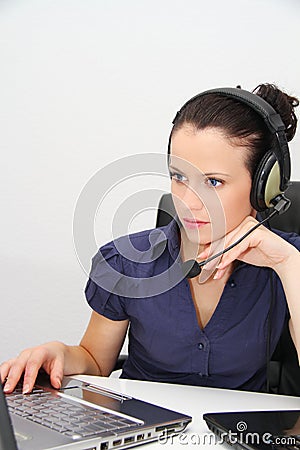 Female customer support operator with headset