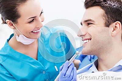 Female dentist with male patient