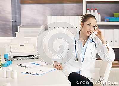 Female doctor on the phone