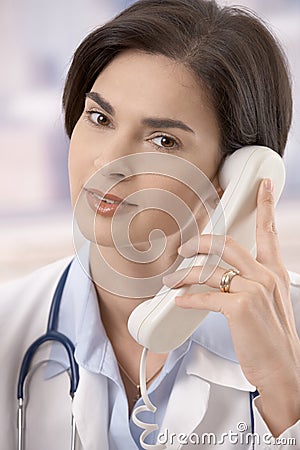 Female doctor on the phone