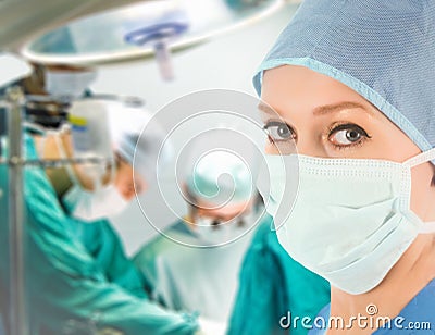 Female doctor with surgical team