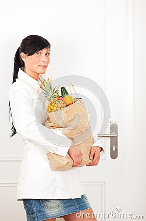 Female on door with food buy
