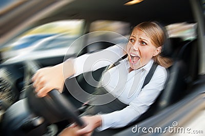 Female driving the car and screaming