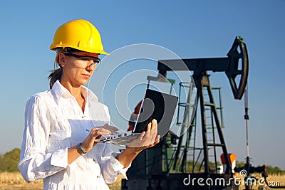 Female engineer in an oilfield