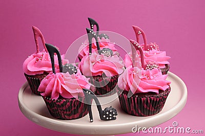 Female high heel stiletto shoes decorated pink and black red velvet cupcakes