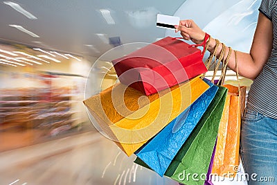 Female holding shopping bags