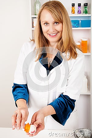 Female Pharmacist with Prescription