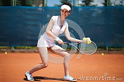 Female playing tennis