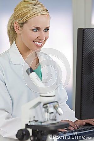 Female Scientist Doctor and Computer In Laboratory