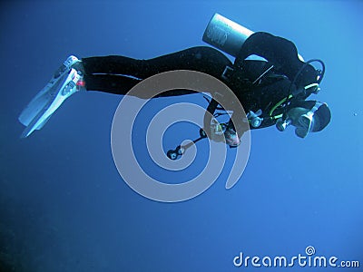 Female scuba diver underwater philippines