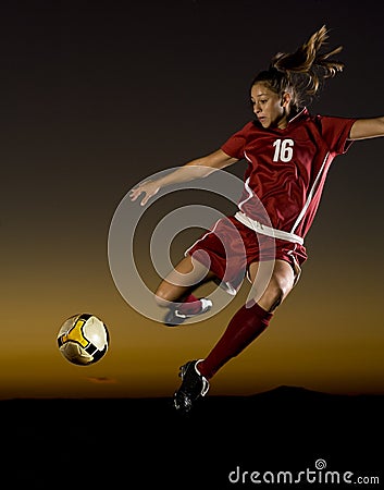 Female Soccer Player About to Kick the Ball